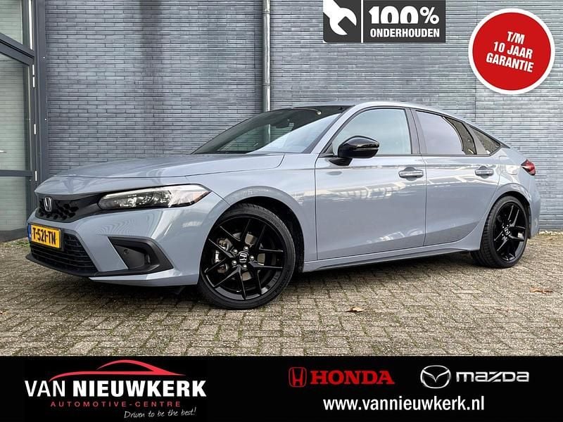 Grijs Occasion 2023 Honda Civic Hybrid Hatchback | € 32.950 (Eerlijke prijs) - Afbeelding 1/4