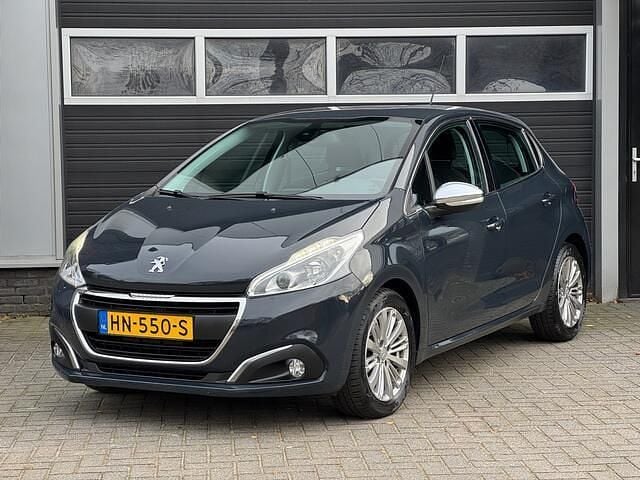 Grijs Gebruikt 2015 Peugeot 208 Allure Hatchback | € 4.950 (Goede deal) - Afbeelding 1/4