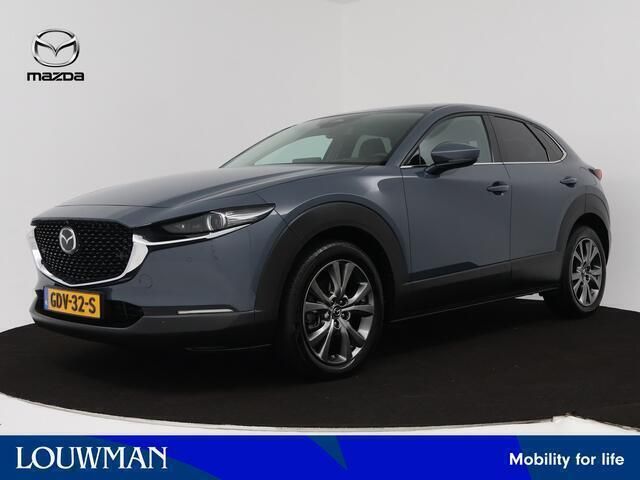 Polymetal gray (grijs metallic) Gebruikt 2024 Mazda CX-30 Exclusive-Line SUV | € 39.445 (Duur) - Afbeelding 1/3