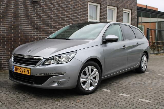 Grijs Gebruikt 2015 Peugeot 308 Stationwagen | € 7.950 (Eerlijke prijs) - Afbeelding 1/4