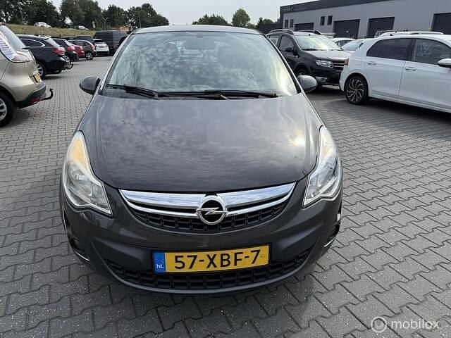 Grijs Gebruikt 2012 Opel Corsa Edition Hatchback | € 3.250 (Super prijs) - Afbeelding 1/4