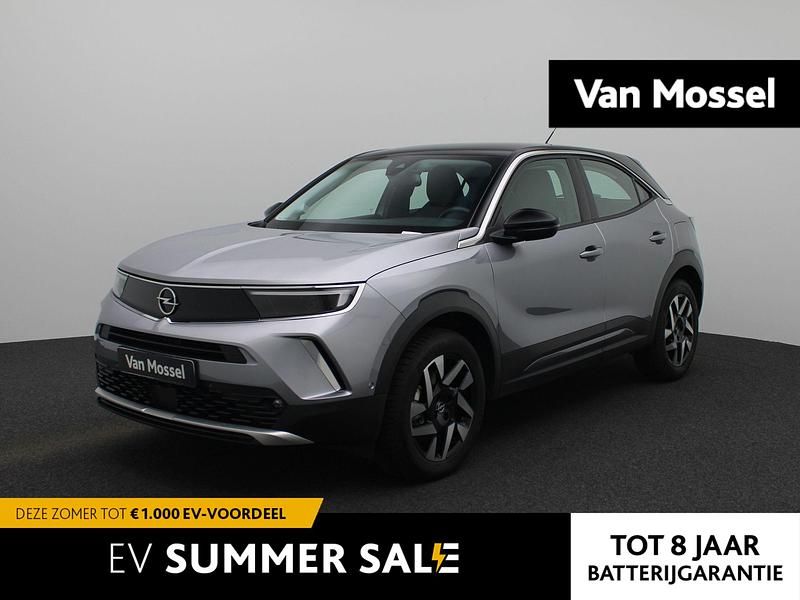 Grijs Gebruikt 2023 Opel Mokka-e Elegance SUV | € 21.900 (Eerlijke prijs) - Afbeelding 1/4