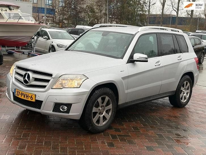 Grijs (metallic) Gebruikt 2011 Mercedes GLK220 Business SUV | € 7.499 (Eerlijke prijs) - Afbeelding 1/4