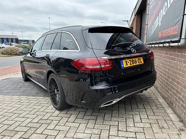 Occasion Mercedes C180 AMG 156 PK (114 kW) 2019 Zwart Stationwagen