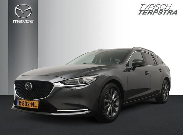 Machine grey (grijs metallic) Occasion 2022 Mazda 6 Stationwagen | € 29.950 (Eerlijke prijs) - Afbeelding 1/4