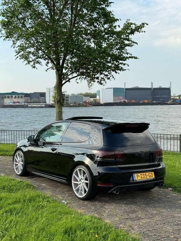 Zwart Gebruikt 2012 VW Golf VII GTI Stationwagen | € 10.950 (Eerlijke prijs) - Afbeelding 1/4