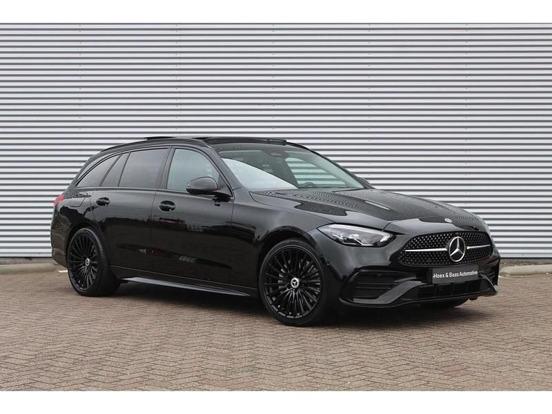 Occasion Mercedes C300 AMG line 204 PK (150 kW) 2022 Zwart Stationwagen
