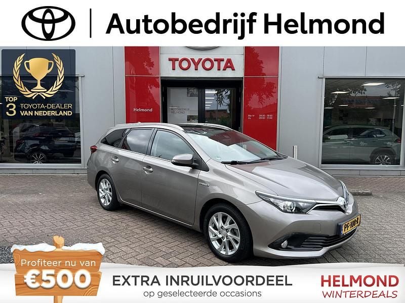 Bruin Occasion 2016 Toyota Auris Hybrid Stationwagen | € 14.999 (Eerlijke prijs) - Afbeelding 1/4