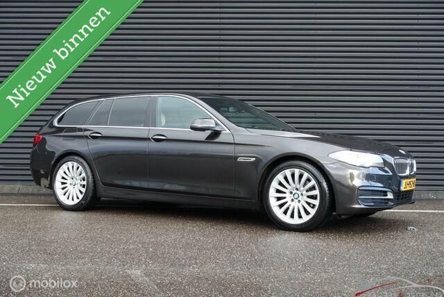 Bruin Gebruikt 2016 BMW 520 Executive Stationwagen | € 19.499 (Iets duurder) - Afbeelding 1/4