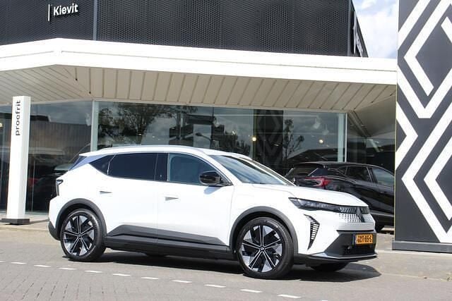 Wit (metallic) Gebruikt 2024 Renault Scenic E-Tech Komfort SUV | € 31.950 (Eerlijke prijs) - Afbeelding 1/3