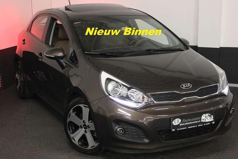 Bruin Gebruikt 2014 Kia Rio Platinum Hatchback | € 11.950 (Duur) - Afbeelding 1/4