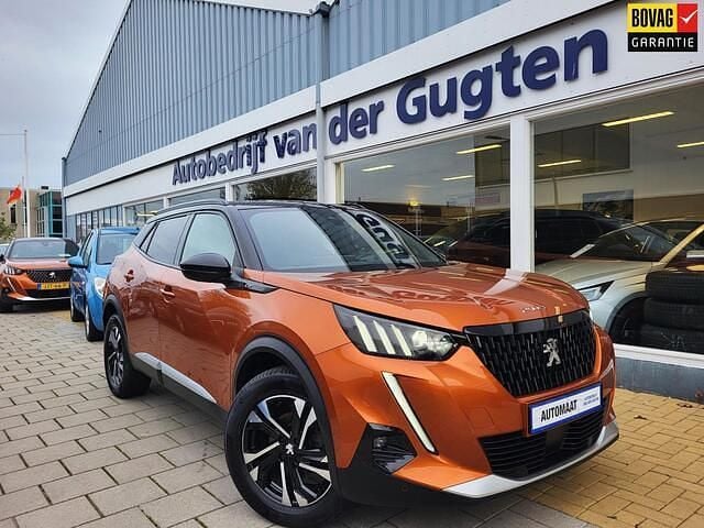 Oranje (metallic) Gebruikt 2021 Peugeot 2008 GTi SUV | € 20.950 (Eerlijke prijs) - Afbeelding 1/4