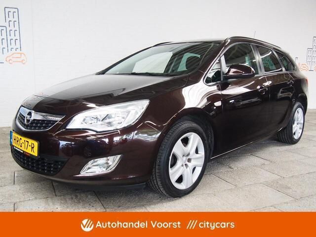 Bruin Gebruikt 2012 Opel Astra Sport Stationwagen | € 7.945 (Iets duurder) - Afbeelding 1/4