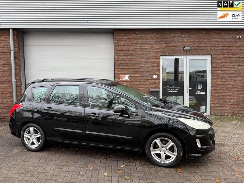 Zwart Gebruikt 2010 Peugeot 308 SW Stationwagen | € 2.999 - Afbeelding 1/4
