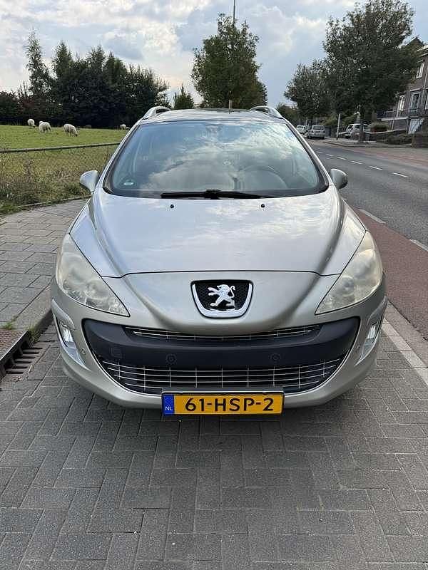 Grijs Gebruikt 2009 Peugeot 308 Stationwagen | € 1.850 (Iets duurder) - Afbeelding 1/4