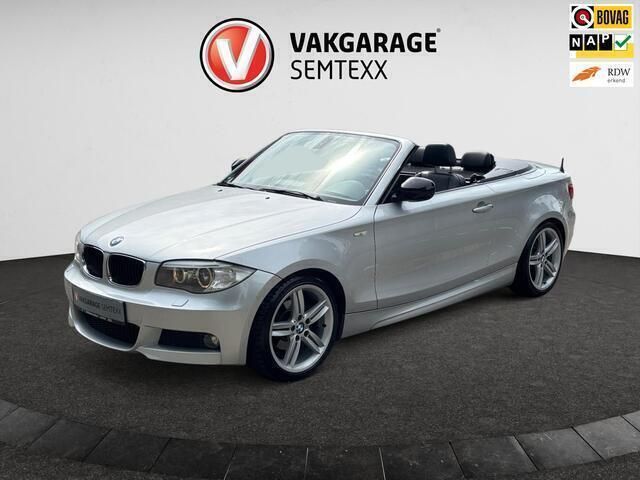 Grijs, metallic lak Gebruikt 2013 BMW 118 Cabriolet Exclusive Cabriolet | € 12.950 (Eerlijke prijs) - Afbeelding 1/4