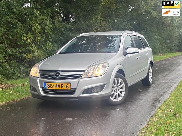 Grijs Gebruikt 2009 Opel Astra Stationwagen | € 1.950 (Goede deal) - Afbeelding 1/4