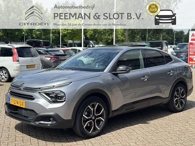 Grijs Gebruikt 2023 Citroën e-C4 Shine Sedan | € 19.950 (Eerlijke prijs) - Afbeelding 1/4