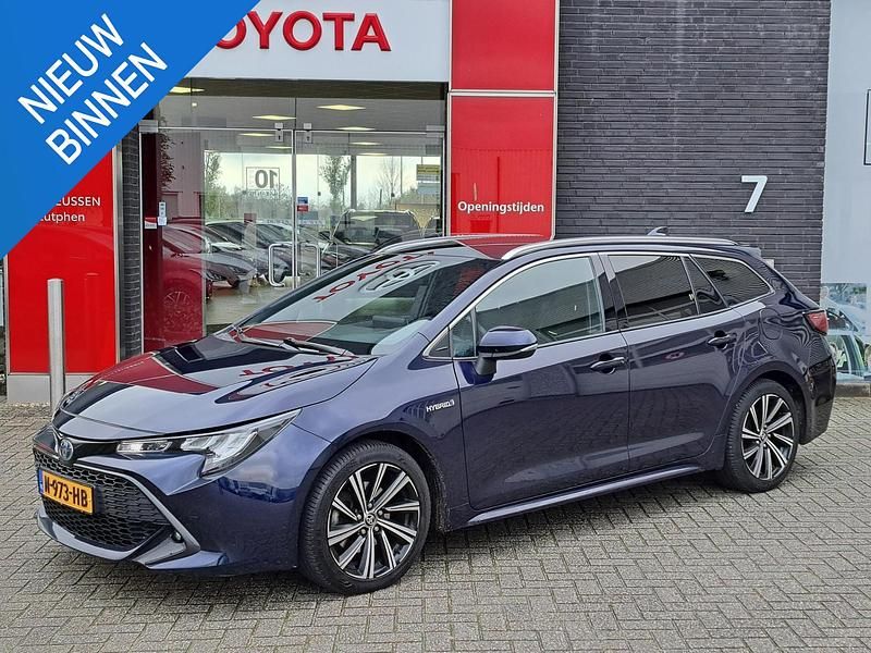 Blauw Gebruikt 2021 Toyota Corolla Play Stationwagen | € 24.900 - Afbeelding 1/4