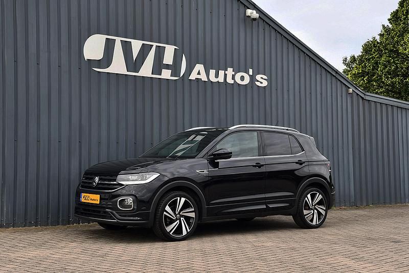 Zwart, metallic lak Gebruikt 2021 VW T-Cross R-line SUV | € 21.750 (Eerlijke prijs) - Afbeelding 1/4