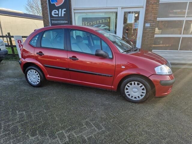 Rood Gebruikt 2014 Citroën C3 First Hatchback | € 2.988 - Afbeelding 1/4