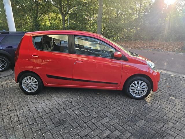 Occasion Daihatsu Cuore 69 PK (50 kW) 2007 Rood Hatchback