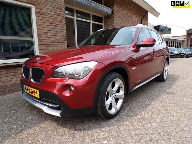 Rood Gebruikt 2012 BMW X1 Luxury Line SUV | € 9.950 (Eerlijke prijs) - Afbeelding 1/4