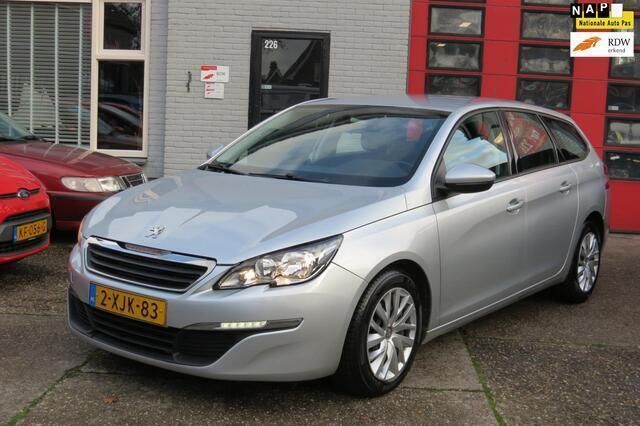 Grijs, metallic lak Gebruikt 2014 Peugeot 308 Access Stationwagen | € 3.999 (Eerlijke prijs) - Afbeelding 1/4