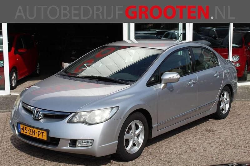 Grijs, metallic lak Gebruikt 2008 Honda Civic Hybrid Sedan | € 3.999 - Afbeelding 1/4