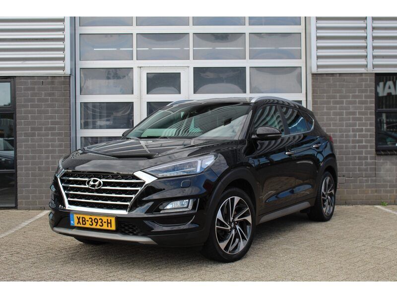 Zwart Gebruikt 2019 Hyundai Tucson Premium SUV | € 23.950 (Eerlijke prijs) - Afbeelding 1/4