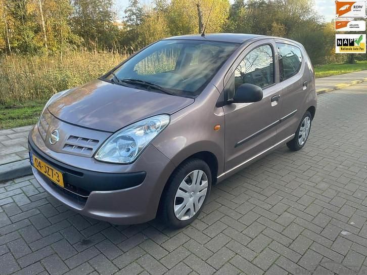 Beige Occasion 2009 Nissan Pixo Visia Hatchback | € 2.999 (Eerlijke prijs) - Afbeelding 1/4