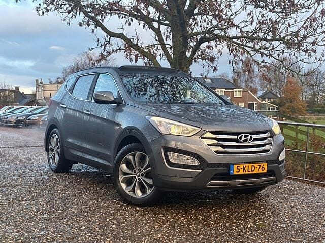 Grijs Gebruikt 2013 Hyundai Santa Fe SUV | € 13.975 (Eerlijke prijs) - Afbeelding 1/4