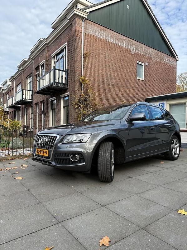 Grijs (parellak) Occasion 2011 Audi Q5 Proline SUV | € 14.500 - Afbeelding 1/4