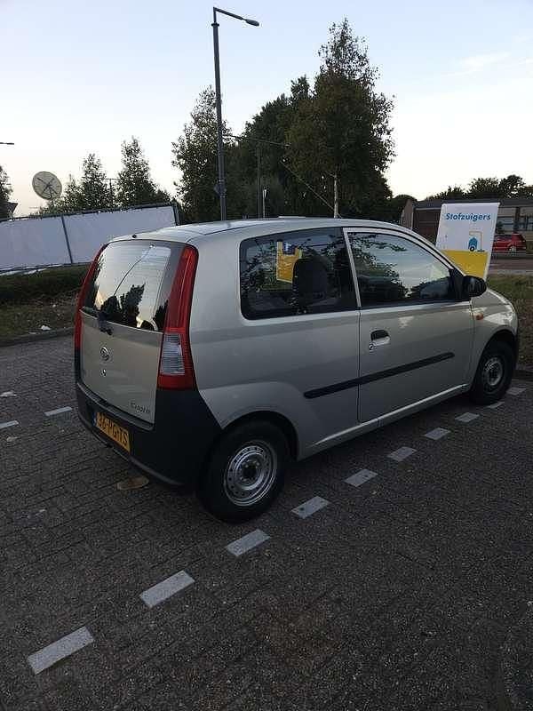Beige Gebruikt 2004 Daihatsu Cuore Hatchback | € 700 (Goede deal) - Afbeelding 1/4