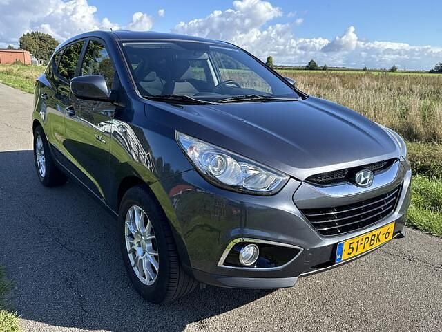Grijs Gebruikt 2011 Hyundai ix35 Dynamiq SUV | € 7.450 (Eerlijke prijs) - Afbeelding 1/4