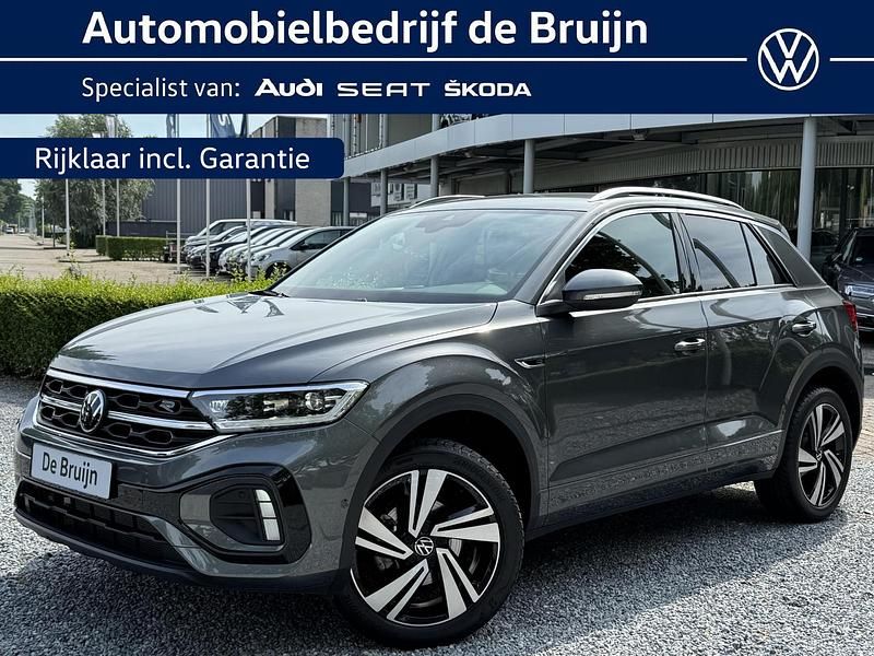 Grijs Occasion 2024 VW T-Roc R-line SUV | € 35.950 (Eerlijke prijs) - Afbeelding 1/4