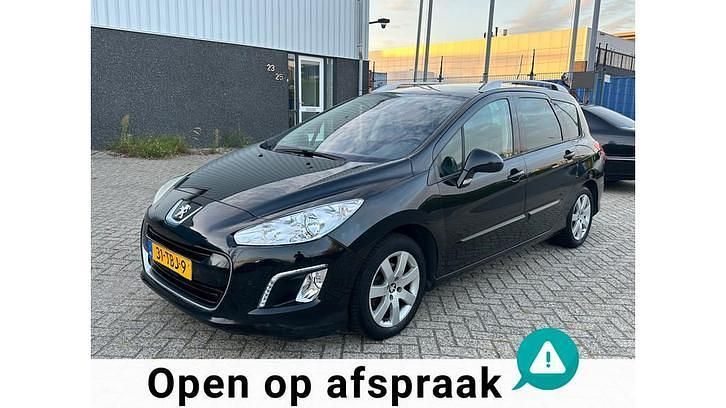 Zwart Occasion 2012 Peugeot 308 SW Stationwagen | € 1.999 (Super prijs) - Afbeelding 1/4