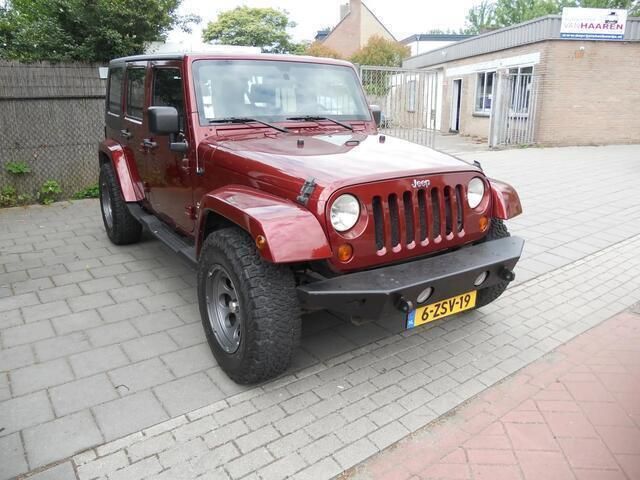 Rood Gebruikt 2009 Jeep Wrangler Unlimited SUV | € 23.400 - Afbeelding 1/4