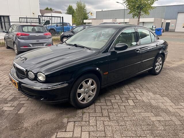 Zwart Gebruikt 2003 Jaguar X-type Sedan | € 1.000 (Goede deal) - Afbeelding 1/4
