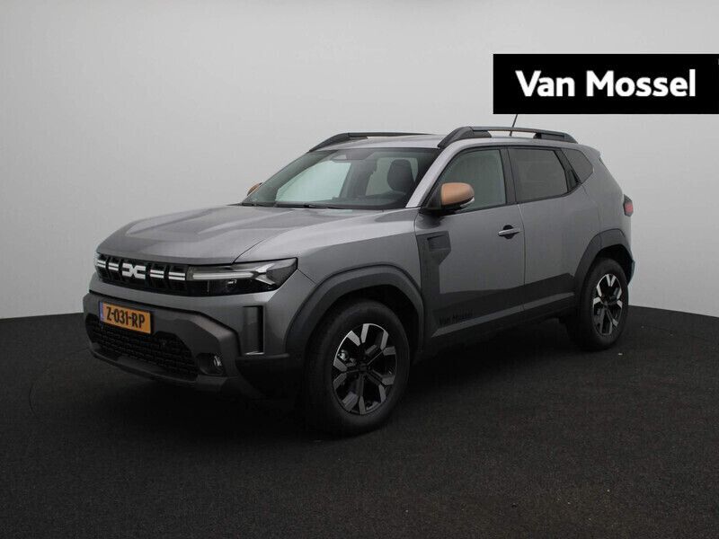Grijs Gebruikt 2024 Dacia Duster Journey SUV | € 27.940 - Afbeelding 1/4
