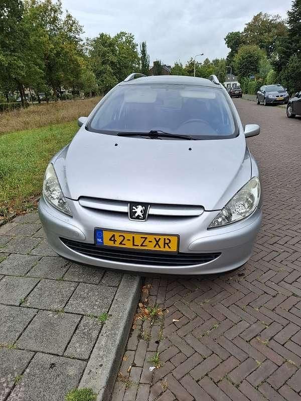 Zilver Gebruikt 2003 Peugeot 307 Stationwagen | € 750 (Super prijs) - Afbeelding 1/4