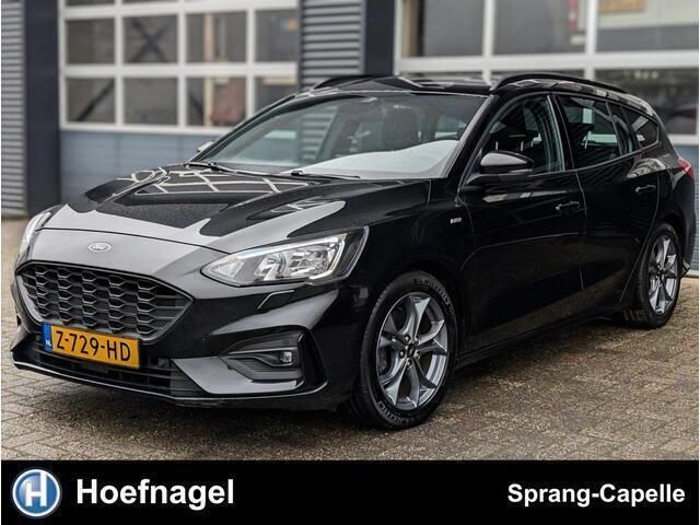 Zwart, metallic lak Gebruikt 2020 Ford Focus ST-Line Stationwagen | € 18.750 (Goede deal) - Afbeelding 1/4