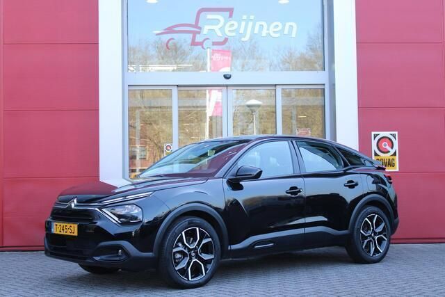 Zwart Gebruikt 2023 Citroën e-C4 Feel SUV | € 17.995 (Goede deal) - Afbeelding 1/4