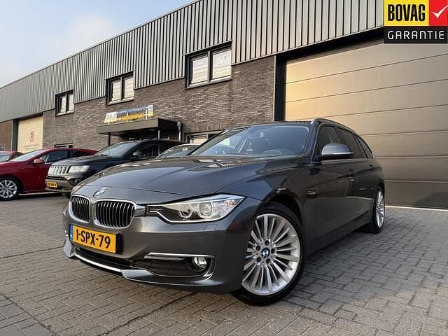 Grijs Gebruikt 2013 BMW 316 Executive Stationwagen | € 14.450 (Eerlijke prijs) - Afbeelding 1/4