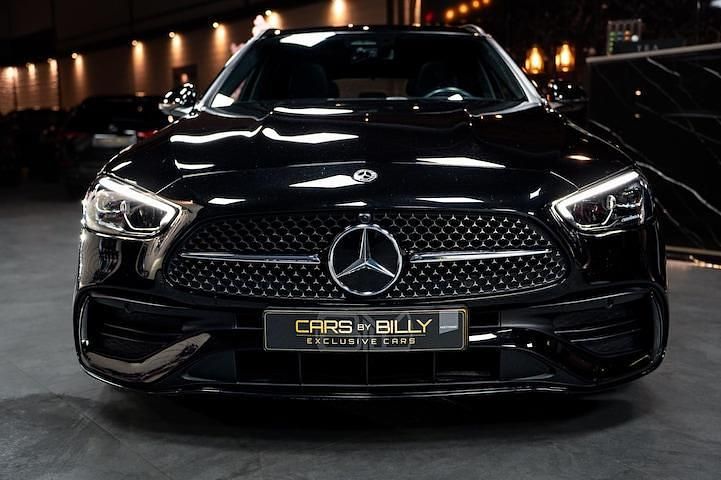 Occasion Mercedes C200 AMG line 204 PK (150 kW) 2022 Zwart Stationwagen