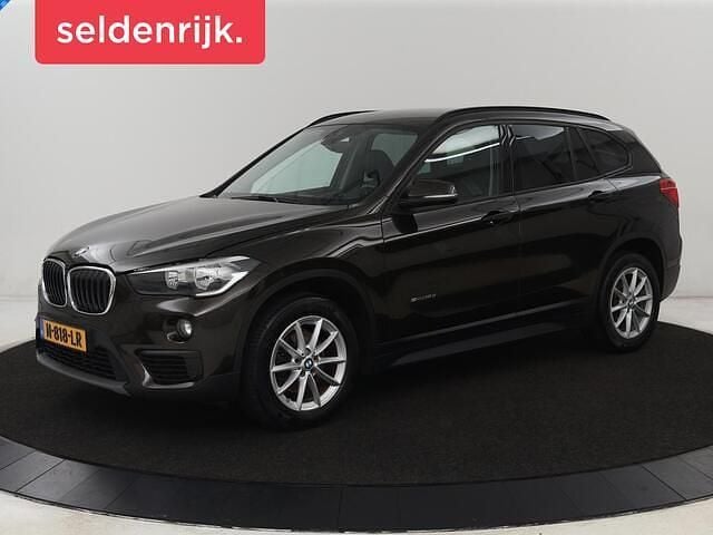 Bruin Gebruikt 2016 BMW X1 Comfort Edition SUV | € 11.900 (Goede deal) - Afbeelding 1/4