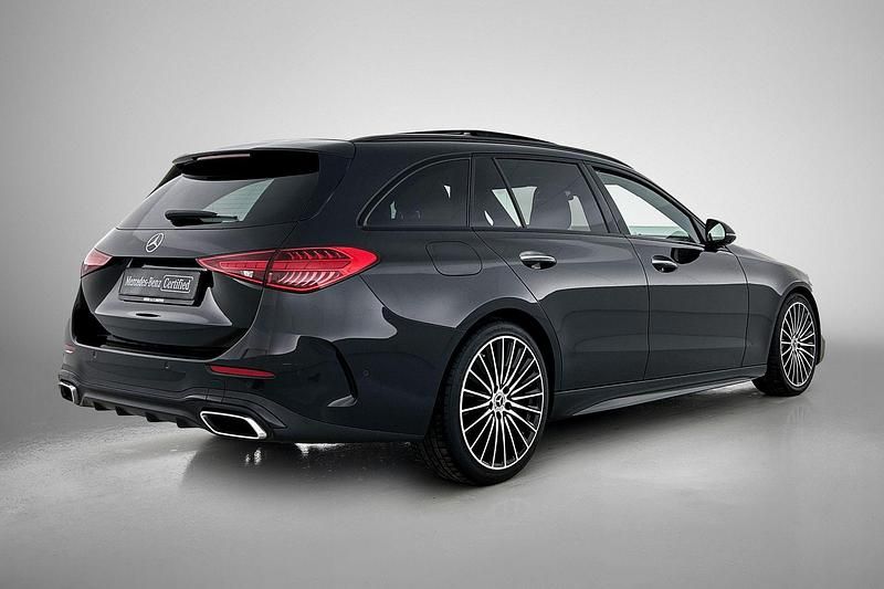 Occasion Mercedes C180 AMG line 170 PK (125 kW) 2022 Zwart Stationwagen