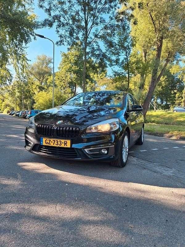 Zwart Gebruikt 2015 BMW 218 Luxury Line Stationwagen | € 7.000 (Goede deal) - Afbeelding 1/4
