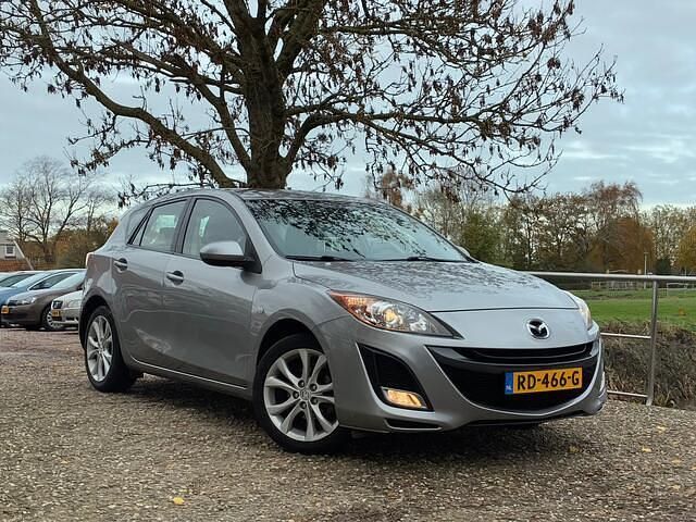 Grijs Gebruikt 2010 Mazda 3 Hatchback | € 6.975 (Eerlijke prijs) - Afbeelding 1/4