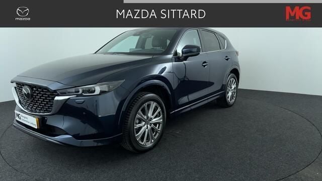 Deep crystal blue Gebruikt 2024 Mazda CX-5 Takumi-Line SUV | € 42.745 (Eerlijke prijs) - Afbeelding 1/4